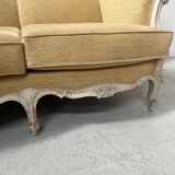 Louis XV style three-seater wingback sofa in patinated beech, 20th century