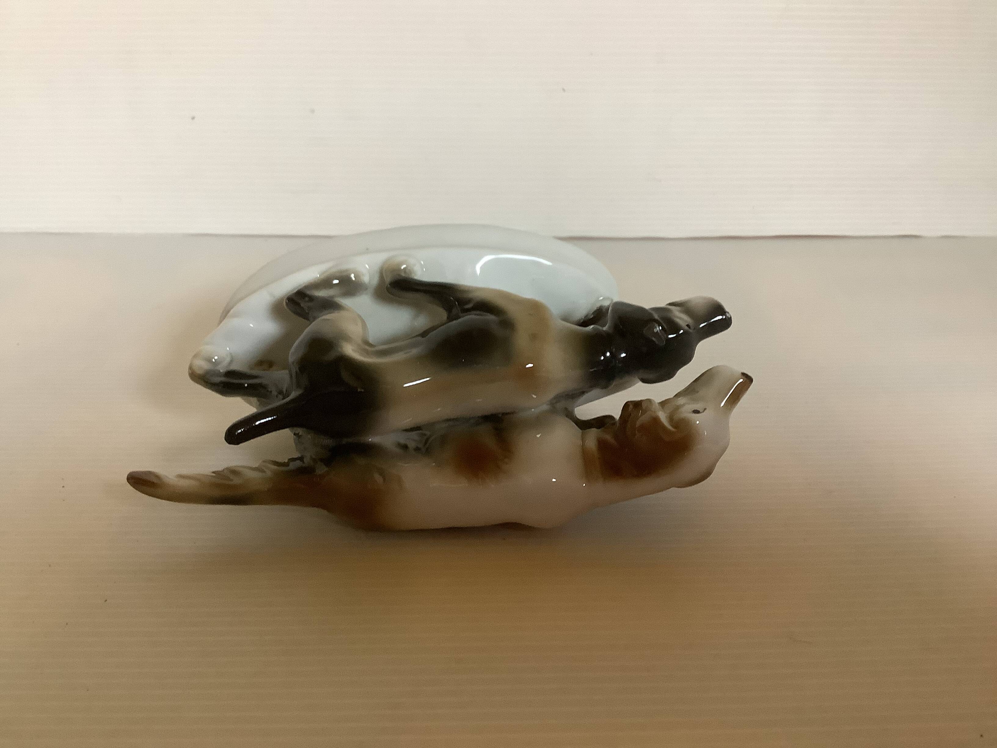 Porcelain dogs
