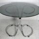 Table style Gastone Rinaldi, Italy, circa 1970. Chromed steel and smoked glass slab.