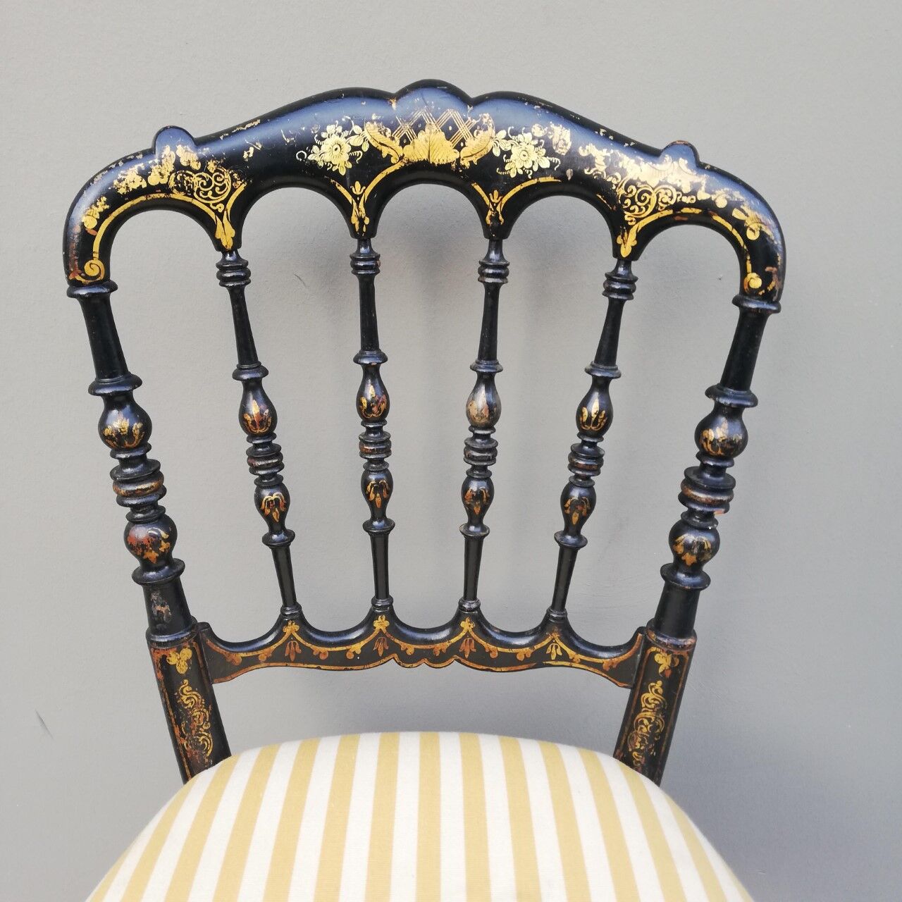 Napoleon III chair late 19th in blackened wood with gilded patterns