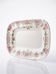 Antique Longchamp serving platter with polychrome daisies in ironstone.