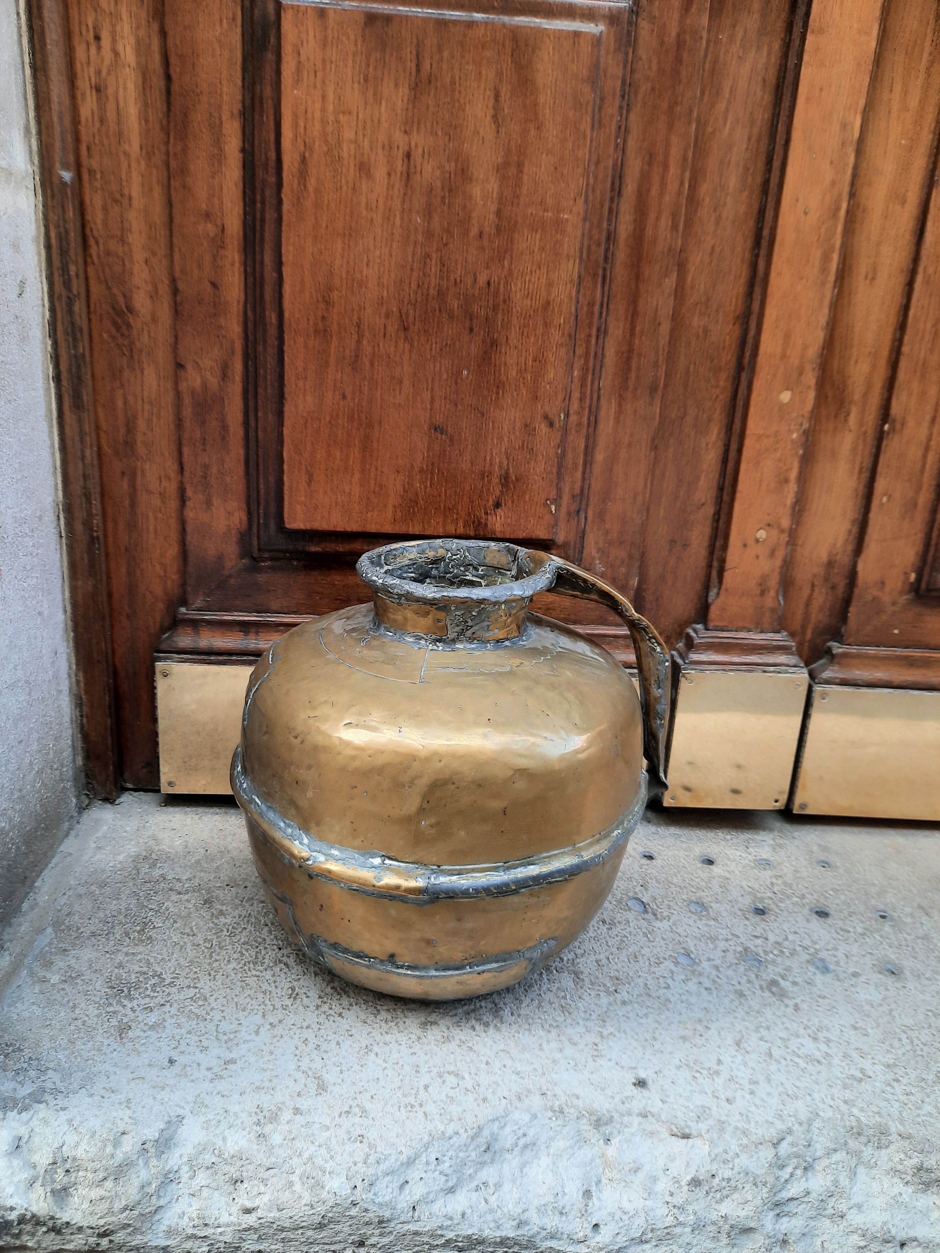 Antique brass jar