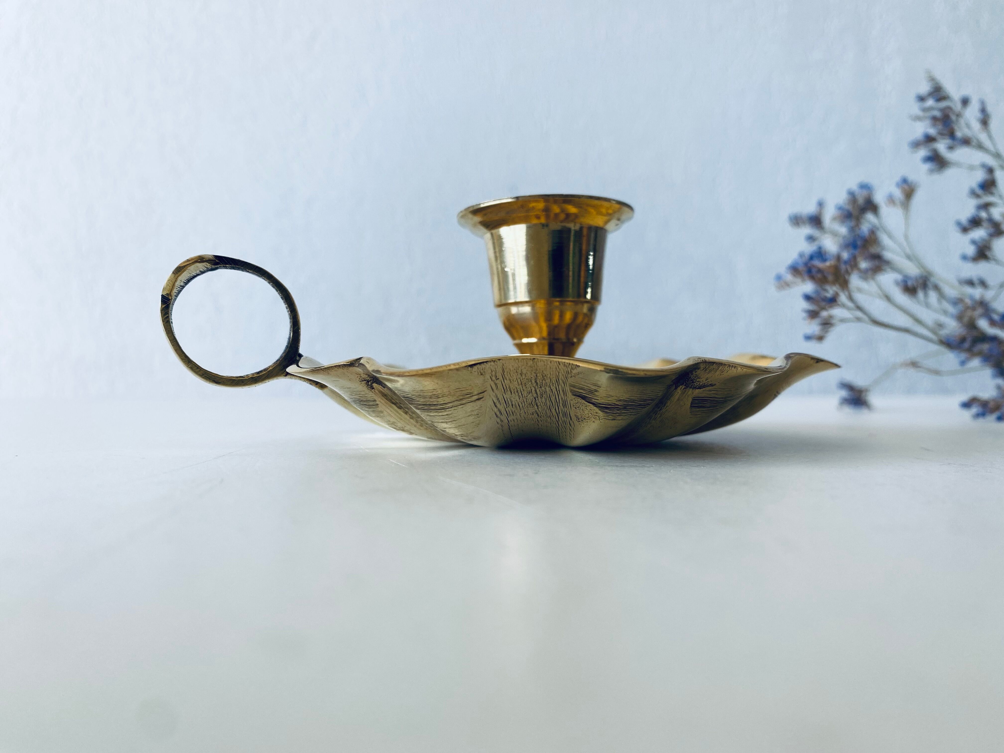 Indian candle holder in golden brass