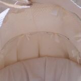 Wicker and painted wood baby cradle