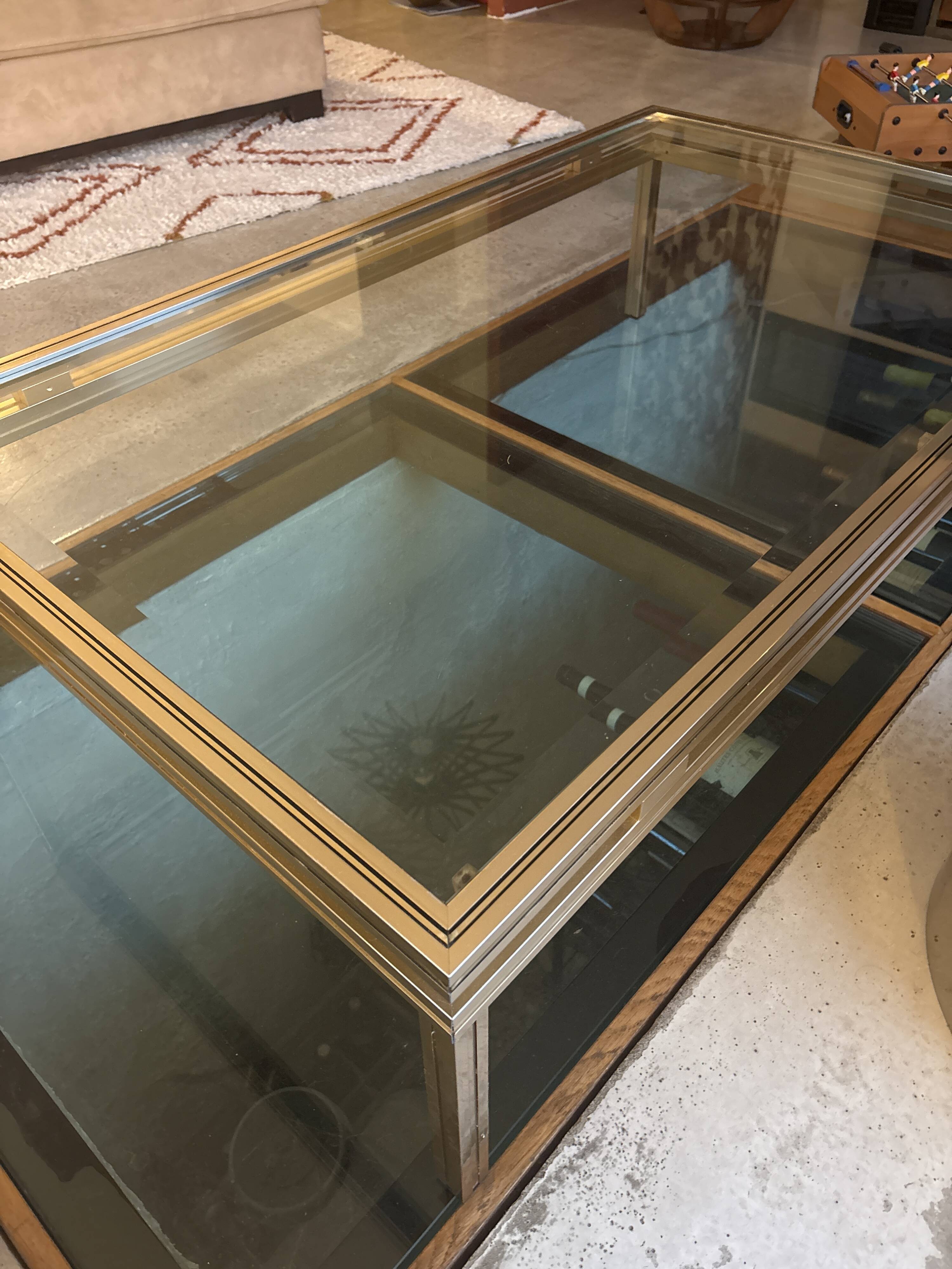 Brass/glass table designed by Pierre Vandel Paris