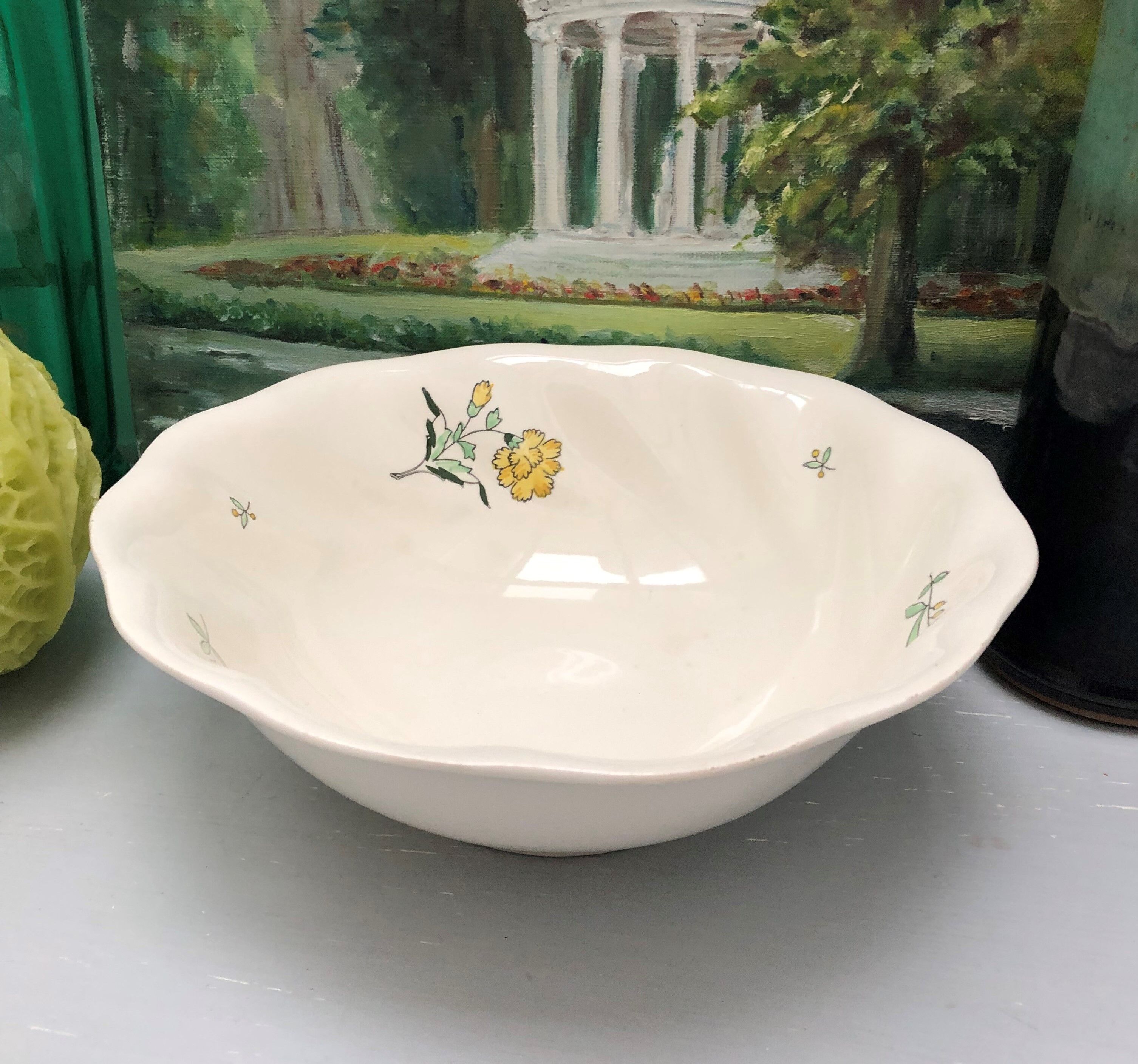 Round dish model embrun, with yellow floral patterns. stamped salins france