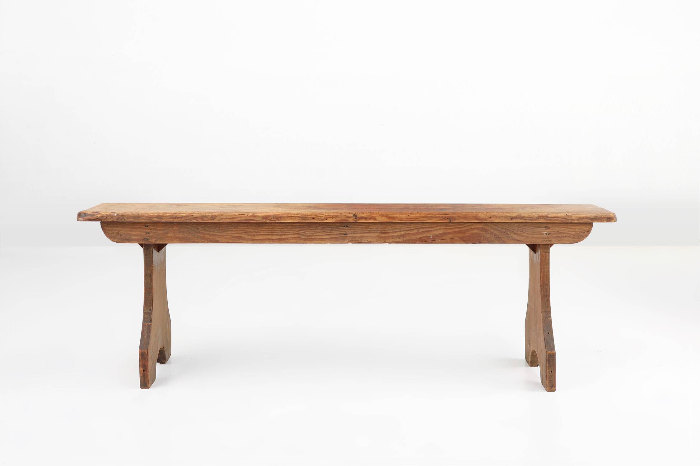 Rustic natural oak wooden bench with rounded details, France ca. 1900
