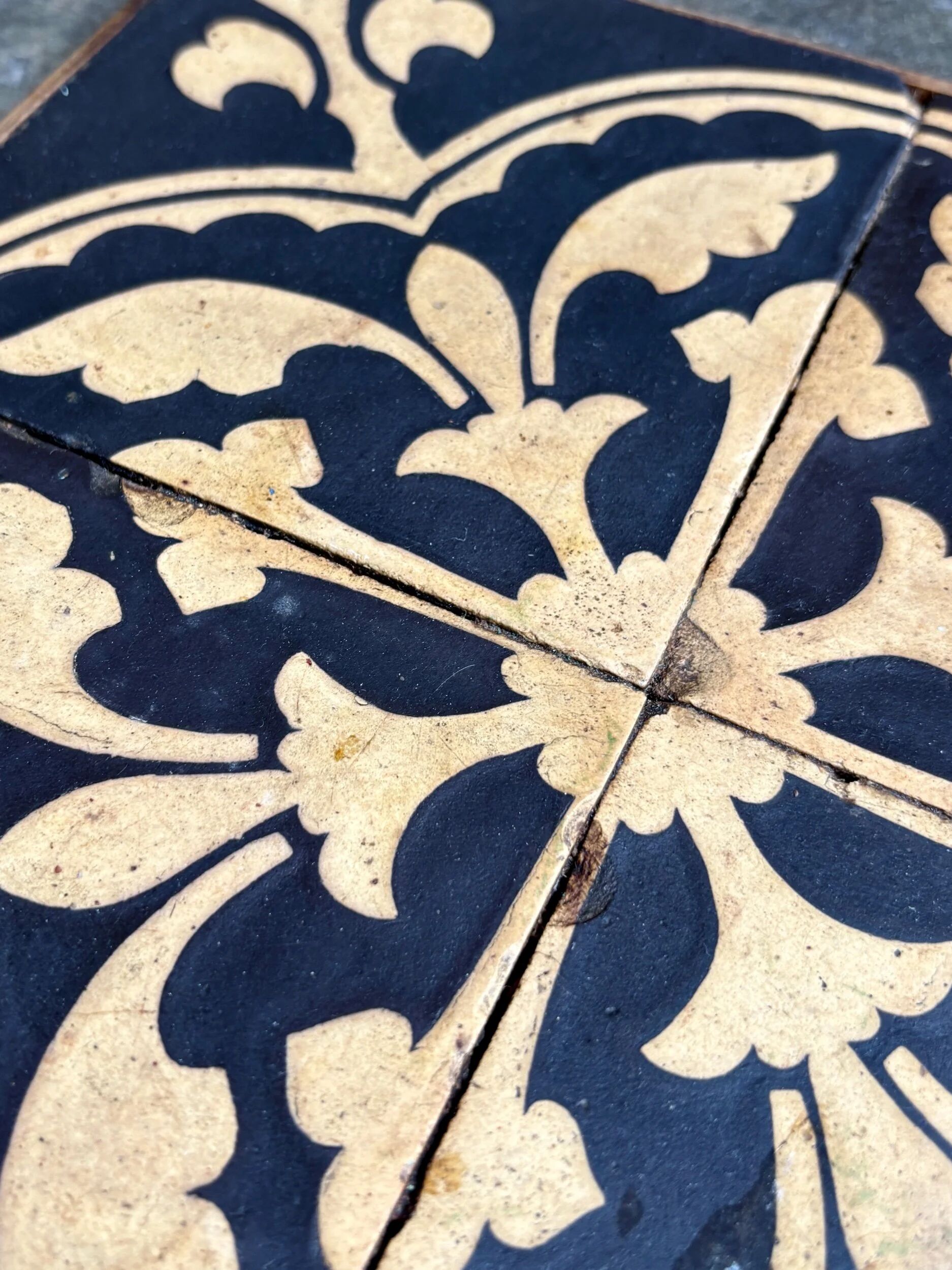 Wooden trivet and cement tiles, 1880