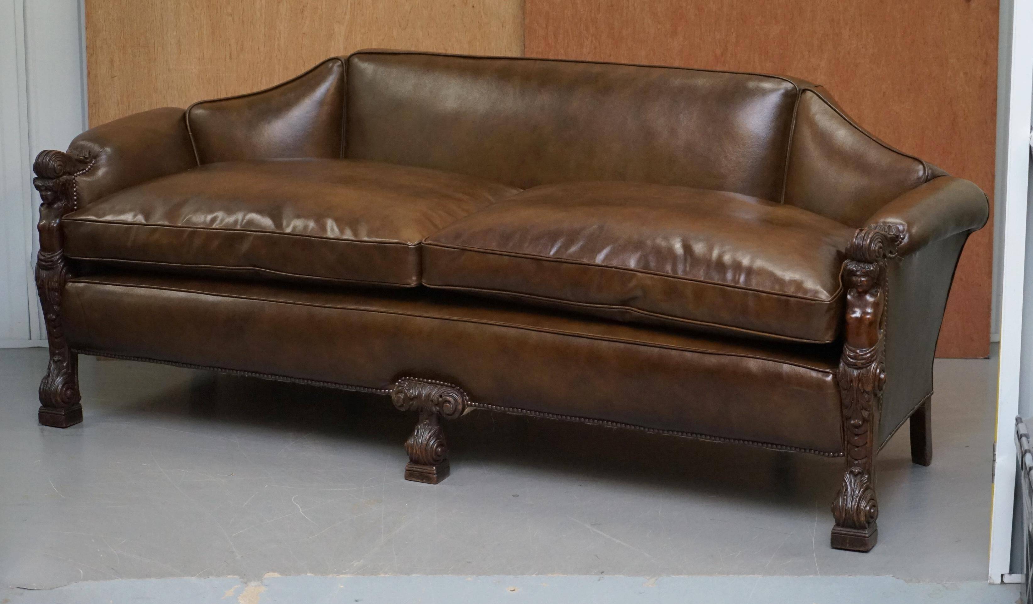 Restored Regency canapé in leather with sculpted Hermès frame.