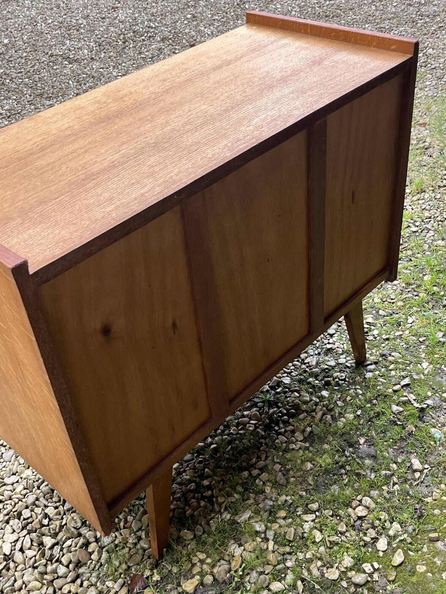 Rattan chest of drawers with tapered legs