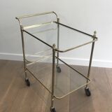 Neoclassical brass rolling table with double glass tops