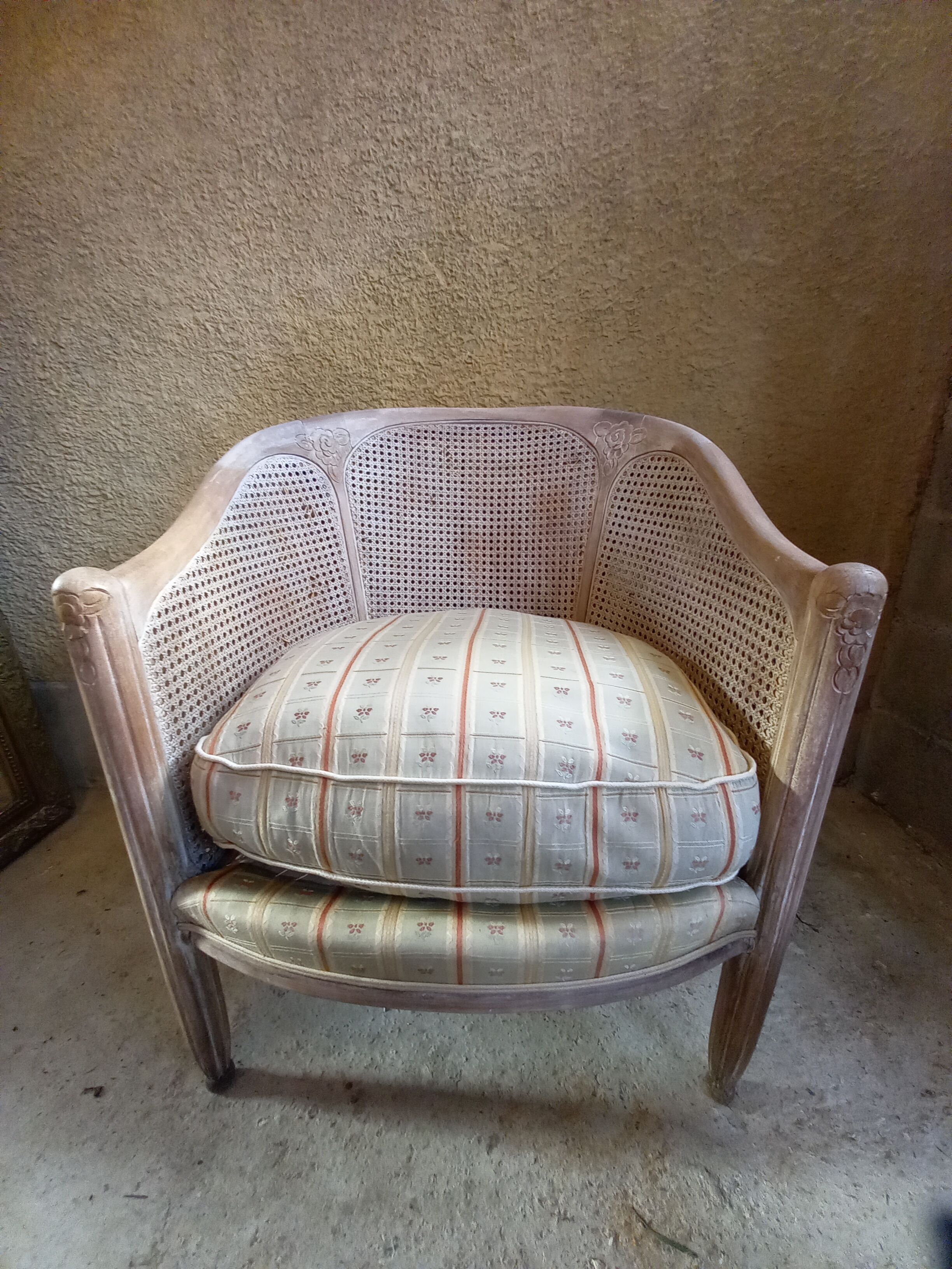Canned basket armchair