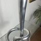 Pair of large aluminium bow candlesticks, Italy, 1970.