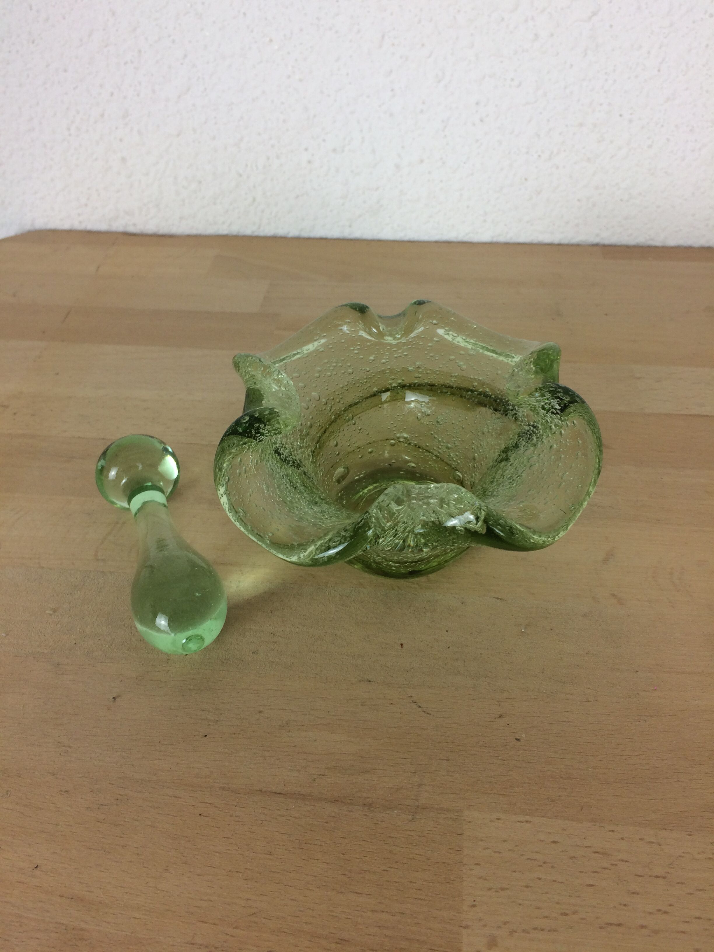 Green bubbled glass mortar and pestle