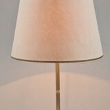 Tripod floor lamp in brass and bakelite 1950