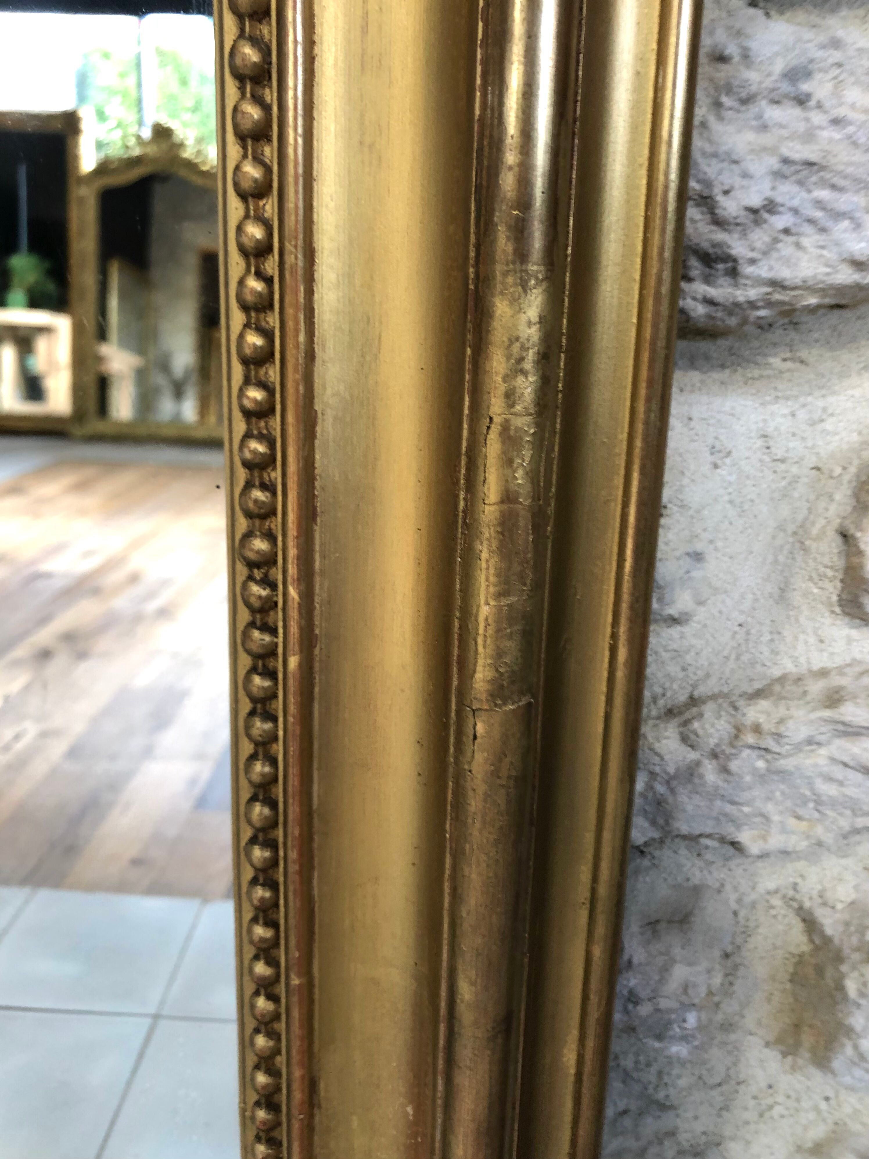 Old fireplace mirror 144cm/97.5cm, pearled, late 19th century, gilded with pricked ice leaf.