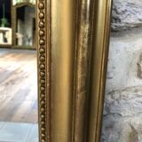Old fireplace mirror 144cm/97.5cm, pearled, late 19th century, gilded with pricked ice leaf.