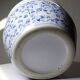 Vintage Chinese cache-pot in blue and white porcelain with a floral design.