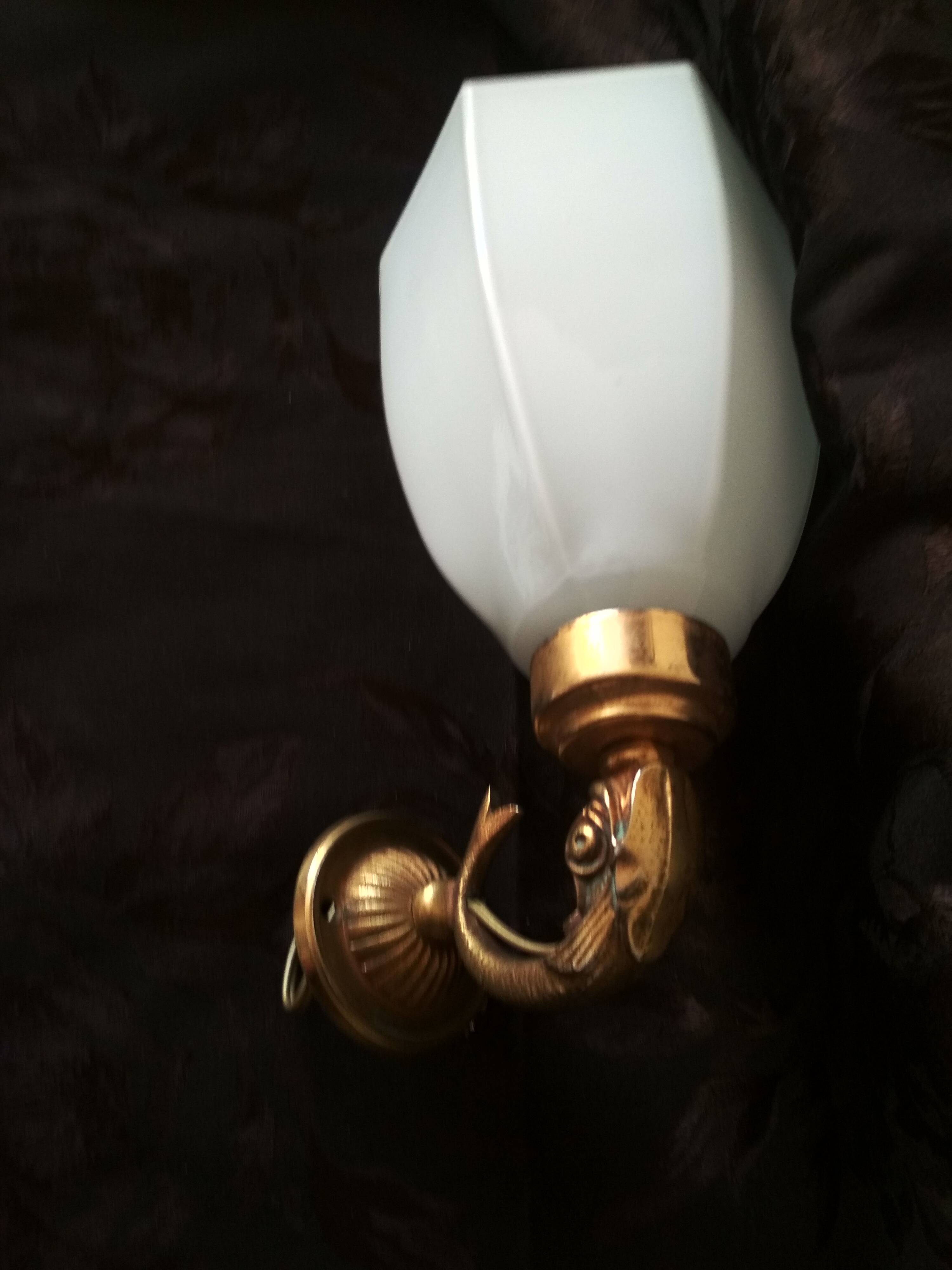 Golden brass wall light with glass tulip - dolphin pattern bathroom lamp