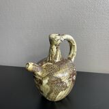 Ceramic pitcher signed Pegomas