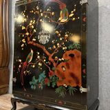 Chinese cabinet in black lacquer and colored decorations