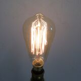 Old lamp with brass foot