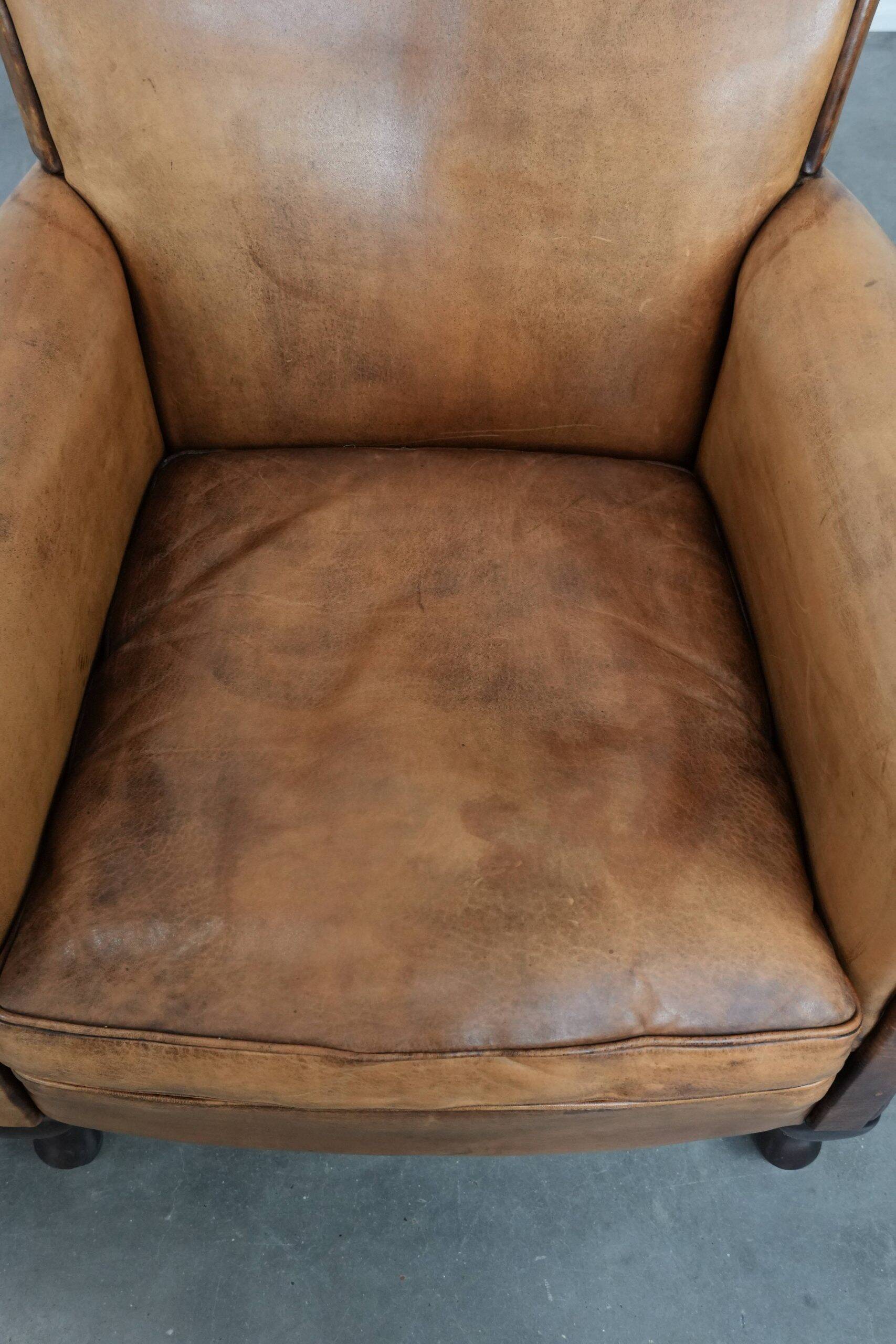 2 fauteuils vintage en cuir de mouton