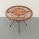 Rattan table with metal leg