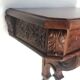 Carved wood side table. 1950s