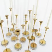 Set of 15 Scandinavian candle holders in brass and glass, Gunnar Ander, Ystad Met