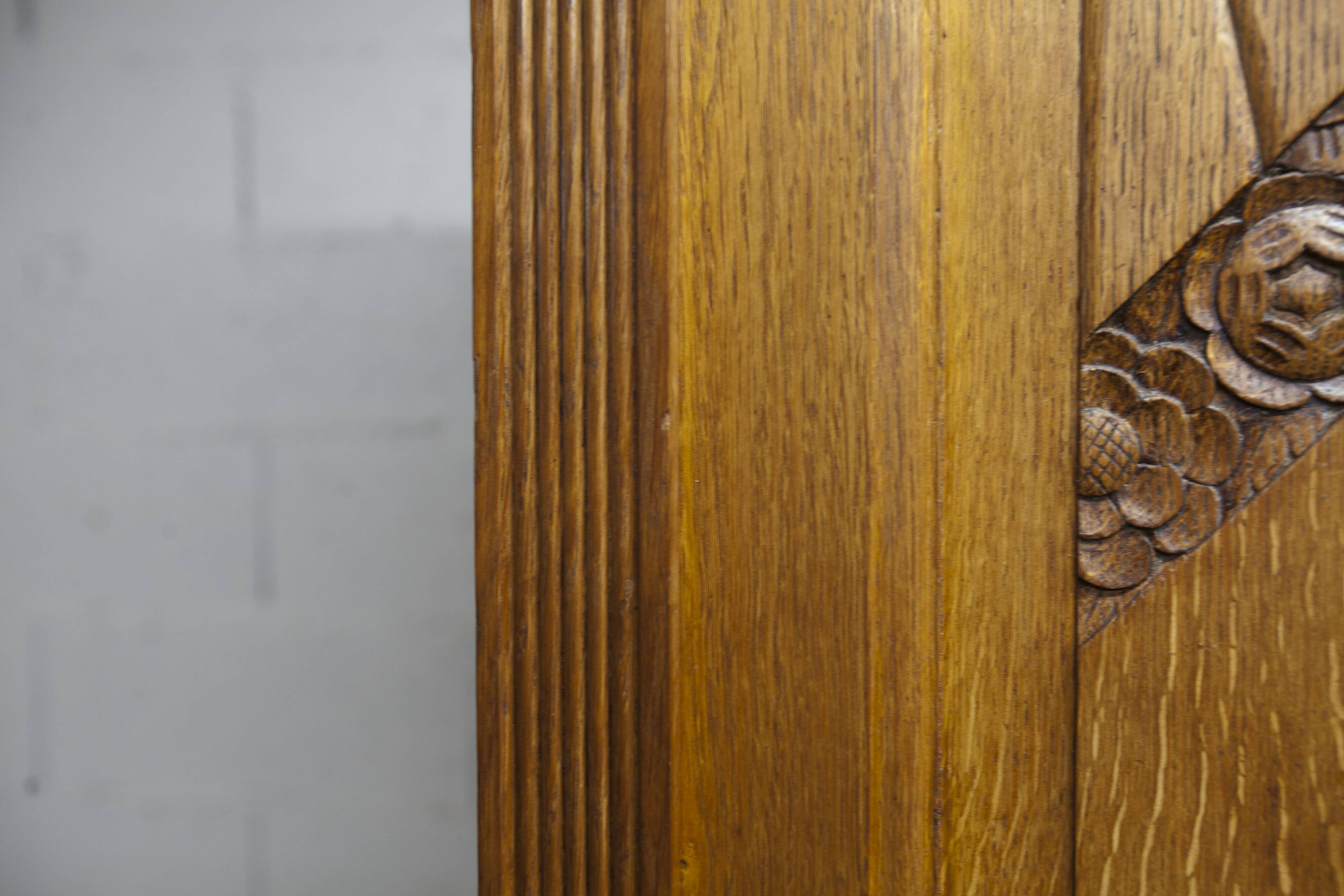 Art Deco carved oak wardrobe - Flemish workshop circa 1930
