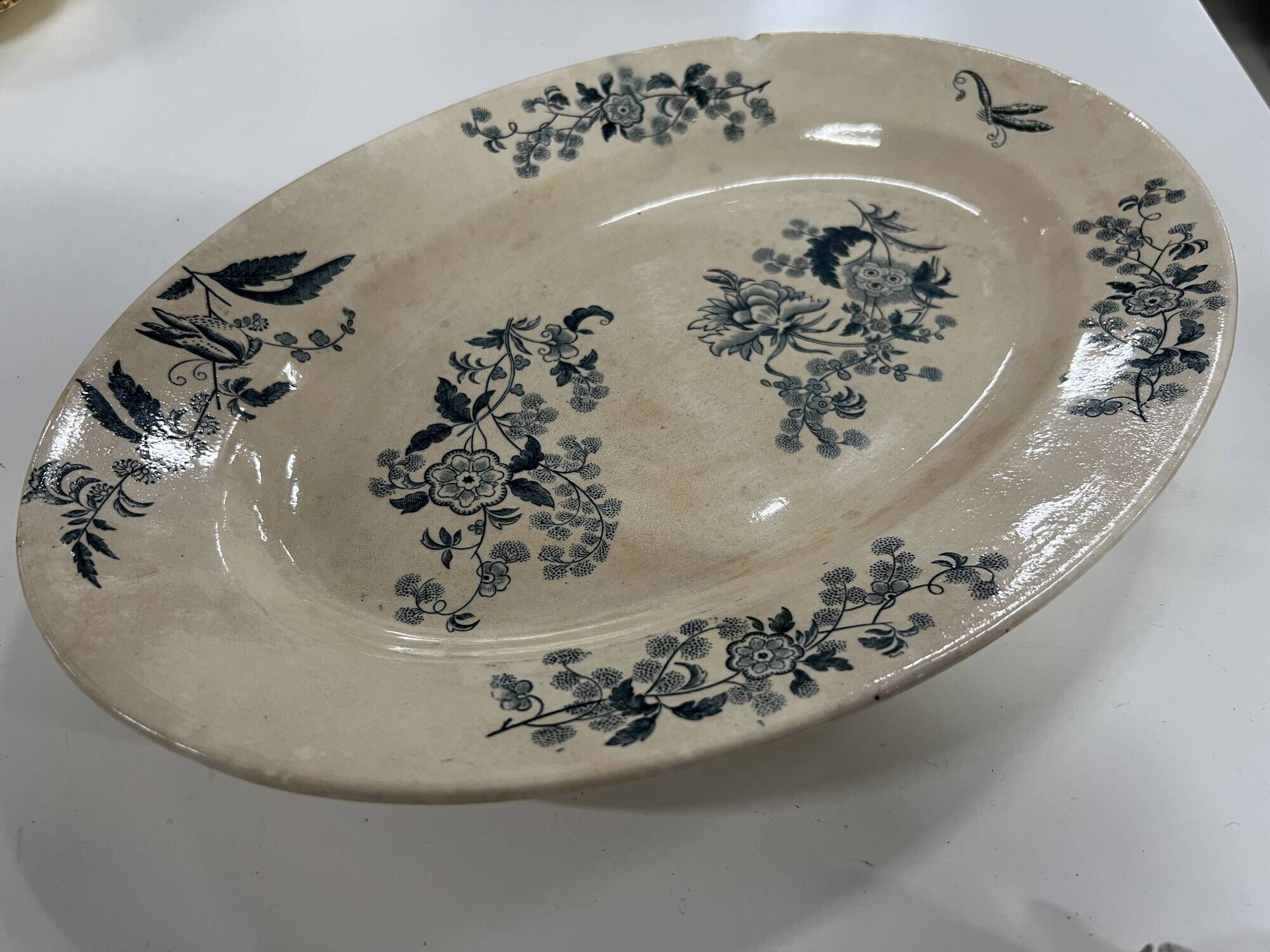 Plat ovale en porcelaine longwy signé yeho