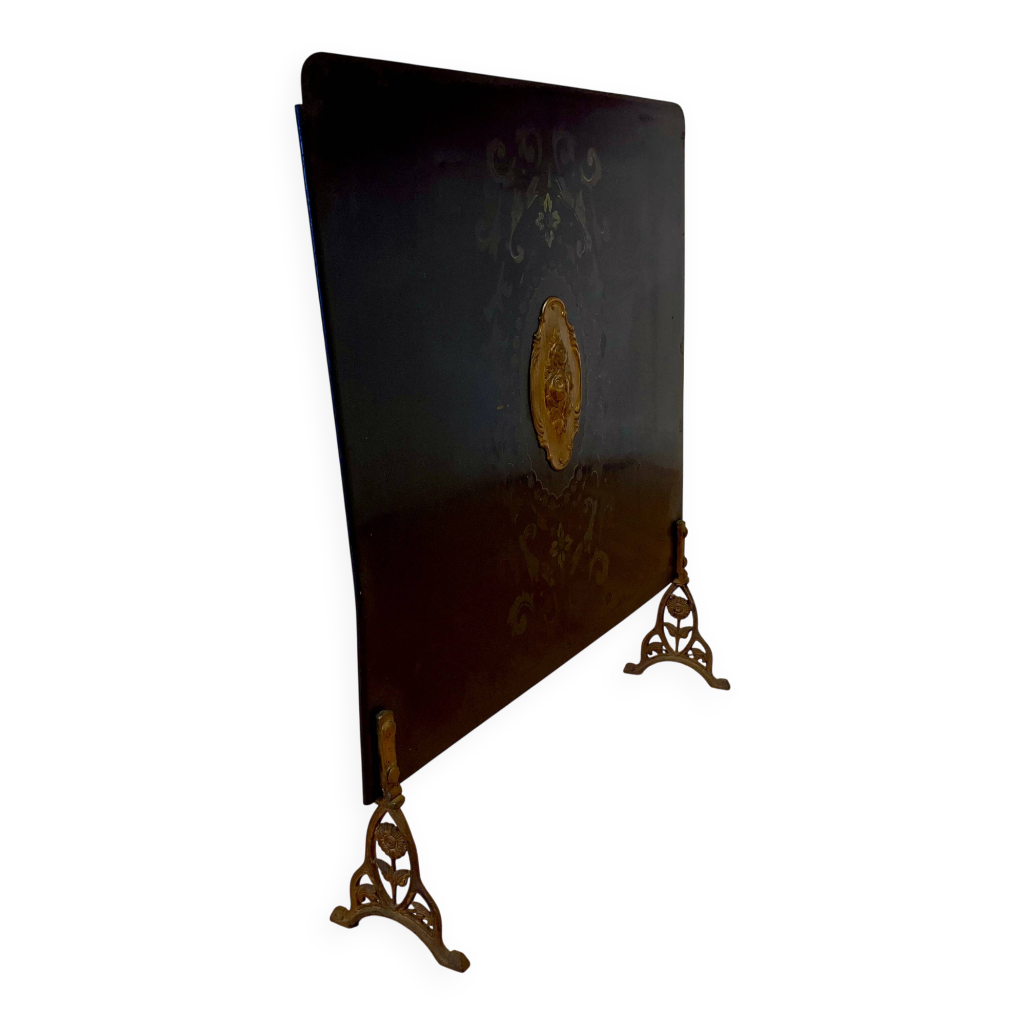 Metal fireplace screen from the period.