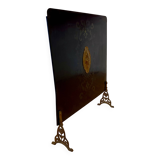 Metal fireplace screen from the period.