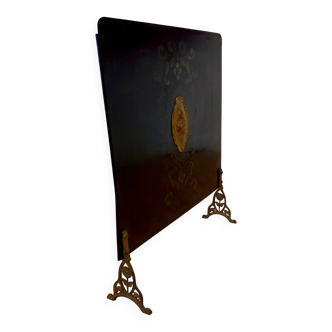 Metal fireplace screen from the period.