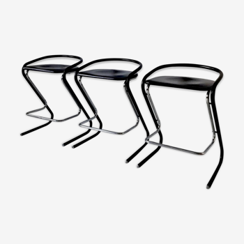 Set of three bar stools black and chrome of Thema Italy to the 1970s