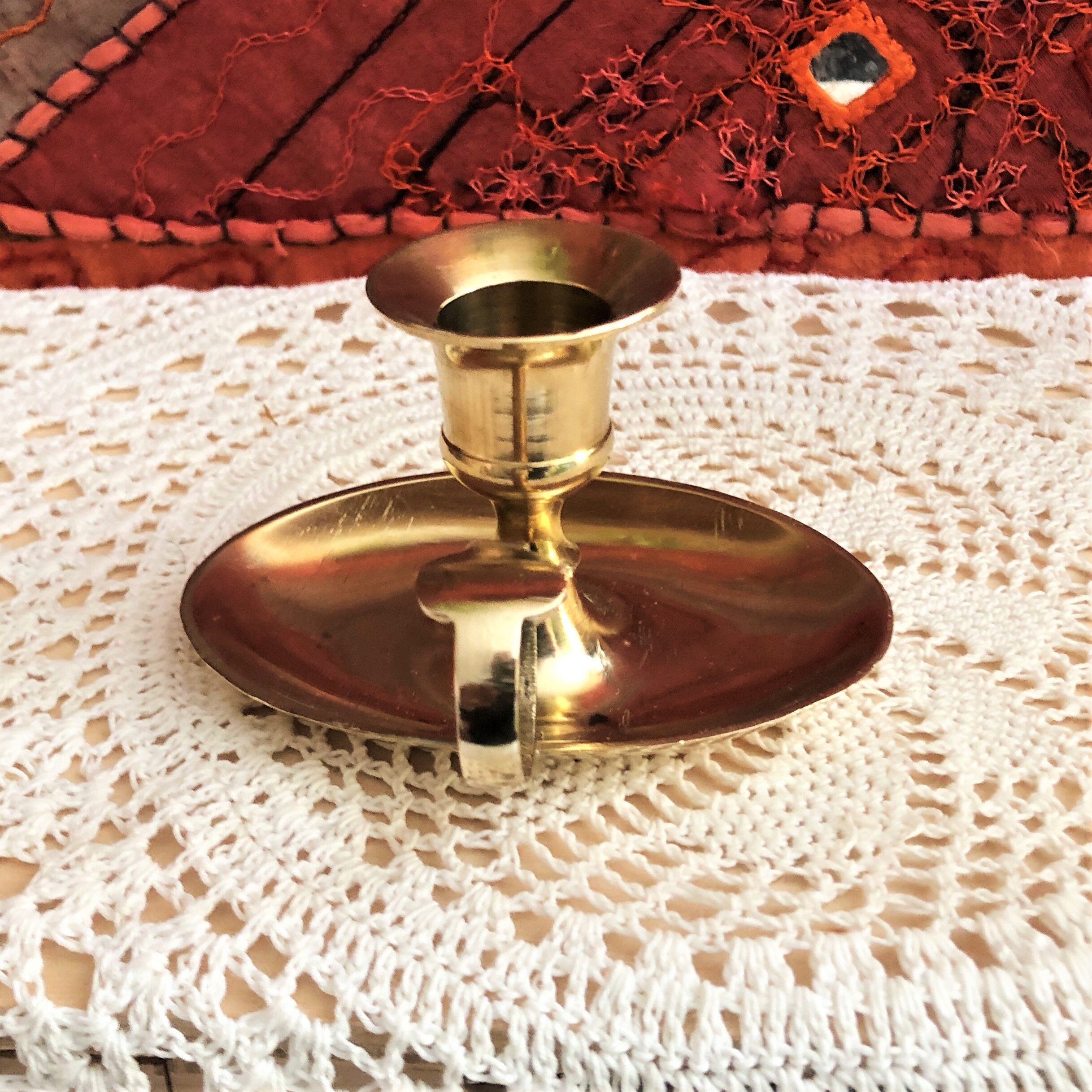 Brass oval hand candle holder