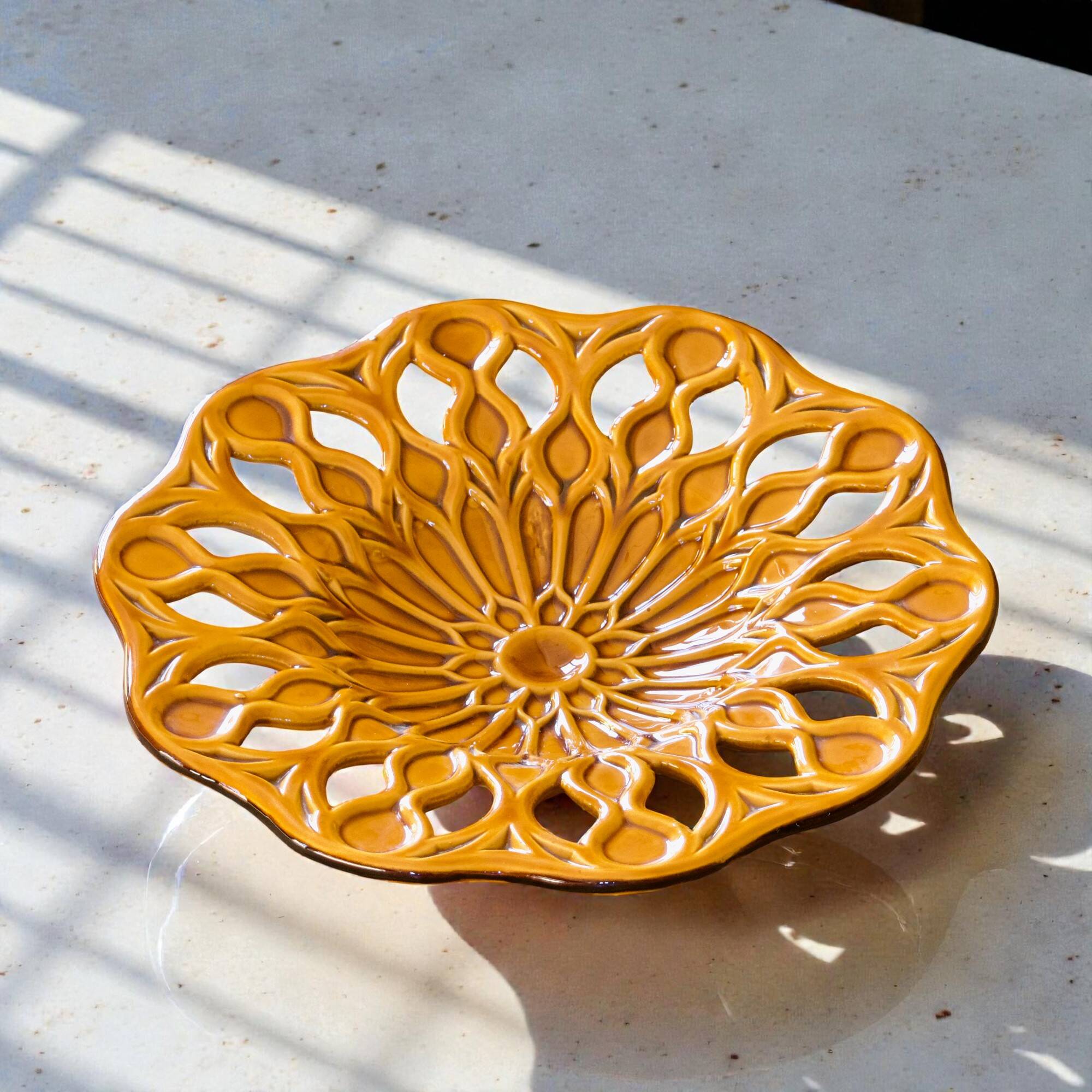 Large openwork majolica fruit bowl in earthenware.