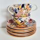 Cups (3) and saucers (6) for coffee in Gien earthenware, "Peonies" pattern.