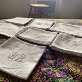 Set of 7 cotton napkins with different monograms
