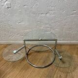 Glass coffee table with 2 swivel tops