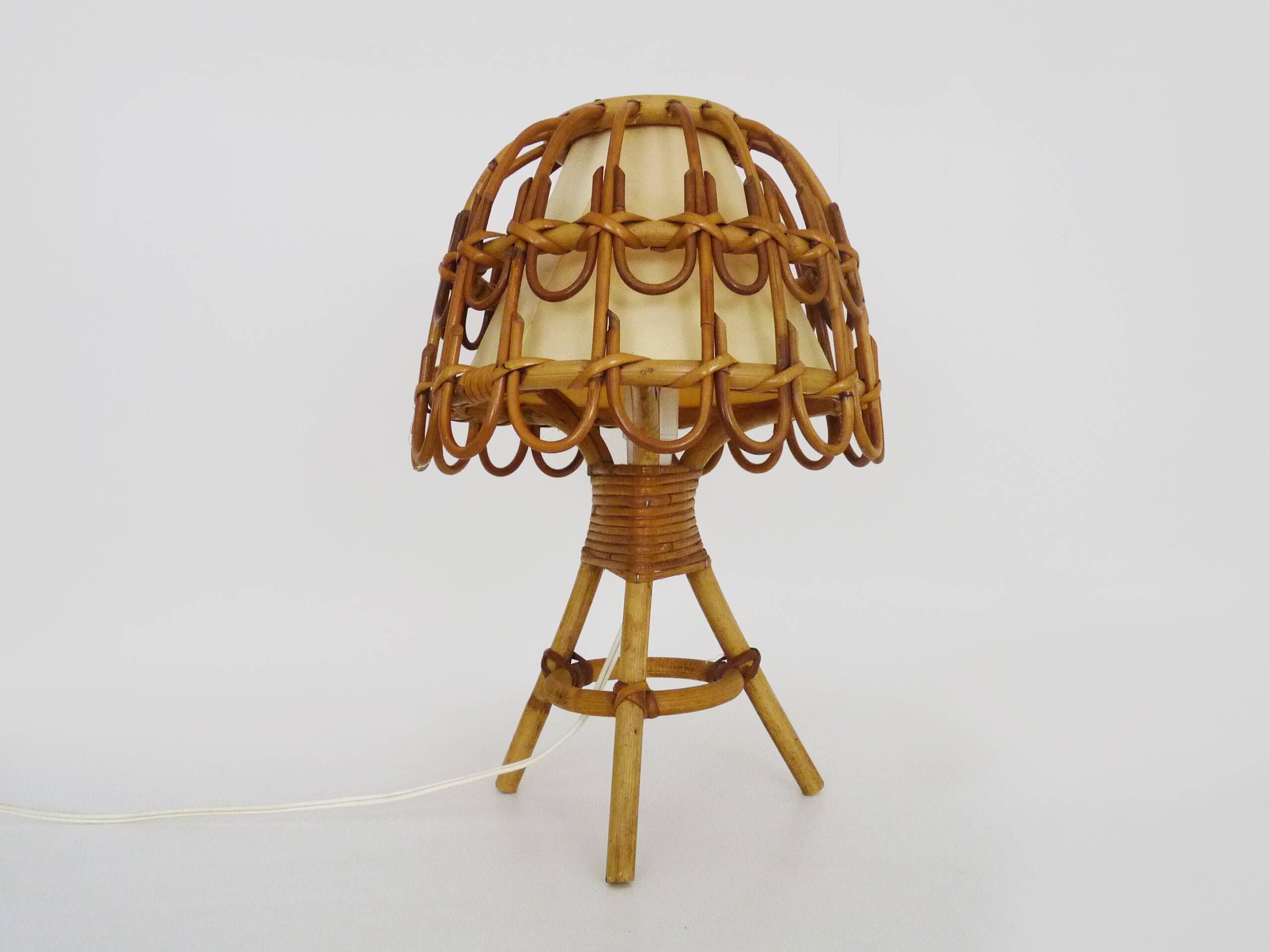 Rattan lamp in the style of Louis Sognot from the 1950s.