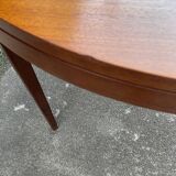 Round teak dining table