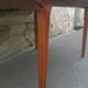 Extendable teak dining table
