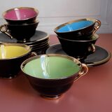 set of 9 black and gold Salins cups and saucers