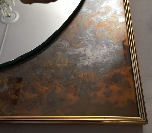 Miroir ovale dans cadre métallique rectangulaire 70x45cm