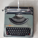 J M Rooy 50s travel writing machine
