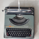 J M Rooy 50s travel writing machine