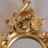 Wooden and gilded mirror with gold leaf