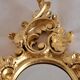 Miroir en bois et doré à la feuille doré